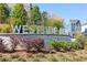 Westside Bend Community Sign with landscaping and a view of new construction homes at 2670 Brookview Nw Ln, Atlanta, GA 30318