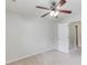 Bright bedroom features neutral carpet, fan with light, and white door at 2725 Sedgeview Way, Buford, GA 30519