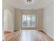Bright dining room featuring hardwood floors, and a modern chandelier at 2725 Sedgeview Way, Buford, GA 30519