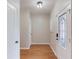 Entryway with hardwood floors, decorative front door, and neutral paint at 2725 Sedgeview Way, Buford, GA 30519