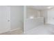 Upstairs hallway with neutral carpet and paint provides access to the various rooms on the second floor at 2725 Sedgeview Way, Buford, GA 30519