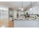 Kitchen with granite countertops, white cabinets, and stainless steel appliances at 2725 Sedgeview Way, Buford, GA 30519