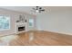 Spacious living room with hardwood floors, fireplace, and natural light at 2725 Sedgeview Way, Buford, GA 30519