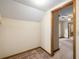 Finished attic space with carpet, sloping ceilings, and closet entry at 2790 Shiloh Way, Snellville, GA 30039