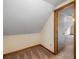 Finished attic space with carpet, sloping ceilings, and access to other rooms at 2790 Shiloh Way, Snellville, GA 30039