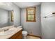 Cozy bathroom featuring a wood-trimmed window for natural light at 2790 Shiloh Way, Snellville, GA 30039