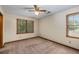 Bedroom with wall-to-wall carpet and two windows allowing natural light to enter at 2790 Shiloh Way, Snellville, GA 30039