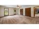 Expansive bedroom featuring natural lighting, ceiling fan, and ample closet space at 2790 Shiloh Way, Snellville, GA 30039