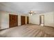 Spacious bedroom with ceiling fan, large windows, and multiple closets at 2790 Shiloh Way, Snellville, GA 30039
