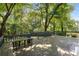 Back deck area with a seating bench and trees at 2790 Shiloh Way, Snellville, GA 30039