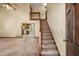 Grand foyer with staircase and an open view to the kitchen, creating a seamless transition at 2790 Shiloh Way, Snellville, GA 30039