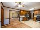 View of open kitchen layout adjacent to living room at 2790 Shiloh Way, Snellville, GA 30039