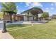 Outdoor amphitheater with a covered stage and lawn seating, perfect for community events at 527 Main St, Suwanee, GA 30024