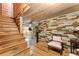 Basement entryway featuring colorful wood accent wall and staircase at 527 Main St, Suwanee, GA 30024