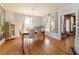 Lovely dining room with chandelier lighting and elegant furnishings at 527 Main St, Suwanee, GA 30024