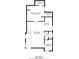 Floor plan highlighting the layout of the primary bedroom, living room, kitchen, and laundry area at 527 Main St, Suwanee, GA 30024