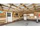 This garage features a wood beam roof and wood paneling at 527 Main St, Suwanee, GA 30024