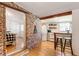 Charming kitchen with retro refrigerator, breakfast bar, and open access to main bedroom at 527 Main St, Suwanee, GA 30024