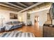 Bright living room with wood floors and textured walls leads to the next room with a fireplace at 527 Main St, Suwanee, GA 30024