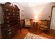 Bedroom featuring hardwood floors, and a seating area at 8315 Nicholson Rd, Cumming, GA 30028