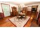 Dining room with hardwood floors and classic furnishings at 8315 Nicholson Rd, Cumming, GA 30028