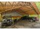 Spacious covered parking area perfect for multiple vehicles or equipment at 8315 Nicholson Rd, Cumming, GA 30028