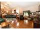 Warm and inviting living area with hardwood floors and a fireplace at 8315 Nicholson Rd, Cumming, GA 30028