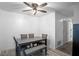 Bright dining room featuring laminate floors, neutral wall color, and modern table with seating at 105 Olde Mill Ln, Norcross, GA 30093