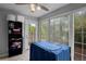 Cozy sunroom with lots of natural light, large windows, and a ceiling fan at 105 Olde Mill Ln, Norcross, GA 30093