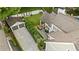 Aerial view showcasing a spacious backyard with a covered patio, outdoor dining, and a detached garage at 1201 Beech Valley Ne Rd, Atlanta, GA 30306
