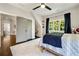 Airy bedroom with plush rug, large window and study nook at 1201 Beech Valley Ne Rd, Atlanta, GA 30306