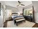 Comfortable bedroom showcasing a ceiling fan and a plush rug at 1201 Beech Valley Ne Rd, Atlanta, GA 30306