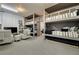 Fun bunk room with gray bunk beds, lounge chairs, and a TV at 1201 Beech Valley Ne Rd, Atlanta, GA 30306