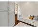 Charming entryway featuring built-in bench seating with storage and shiplap walls at 1201 Beech Valley Ne Rd, Atlanta, GA 30306