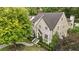 Exterior shot shows a home with manicured landscaping, a stone pathway, and a well-maintained lawn and garden at 1201 Beech Valley Ne Rd, Atlanta, GA 30306