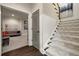 Elegant hallway with carpeted stairs leading to a cozy living room at 1201 Beech Valley Ne Rd, Atlanta, GA 30306