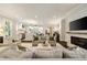 Bright and open living room connected to modern kitchen with a fireplace at 1201 Beech Valley Ne Rd, Atlanta, GA 30306