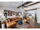 Spacious living room with high ceilings, wooden beams, and an open floor plan at 1314 Arkwright Se Pl, Atlanta, GA 30317