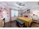 Comfortable bedroom features tray ceilings, lots of natural light, and decorative artwork at 1314 Arkwright Se Pl, Atlanta, GA 30317