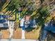 Top-down aerial perspective of the property showcasing the roof, driveway, and surrounding landscape at 1355 Compton Woods Dr, Loganville, GA 30052