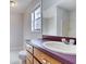Bathroom with vanity, mirror, and toilet at 1355 Compton Woods Dr, Loganville, GA 30052