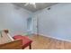 Bedroom features wood floors, bright natural light, and neutral paint at 1355 Compton Woods Dr, Loganville, GA 30052