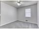 Comfortable bedroom featuring neutral walls, carpet, and natural light at 1355 Compton Woods Dr, Loganville, GA 30052