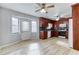 Well-lit kitchen featuring wooden cabinets, appliances, and a door to the outside at 1355 Compton Woods Dr, Loganville, GA 30052