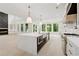Modern kitchen features a large island with seating, high-end appliances, and an open layout perfect for entertaining at 2977 N Bogan Rd, Buford, GA 30519