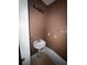 Compact bathroom with pedestal sink and standard fixtures at 4752 Browns Mill Ferry Rd, Lithonia, GA 30038