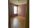 Bedroom with wood flooring and window at 4752 Browns Mill Ferry Rd, Lithonia, GA 30038