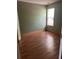 Bedroom with vinyl flooring and natural light at 4752 Browns Mill Ferry Rd, Lithonia, GA 30038