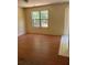Bright dining room featuring vinyl floors at 4752 Browns Mill Ferry Rd, Lithonia, GA 30038