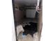 This is a view of a garage, with an oil stain on the floor at 4752 Browns Mill Ferry Rd, Lithonia, GA 30038
